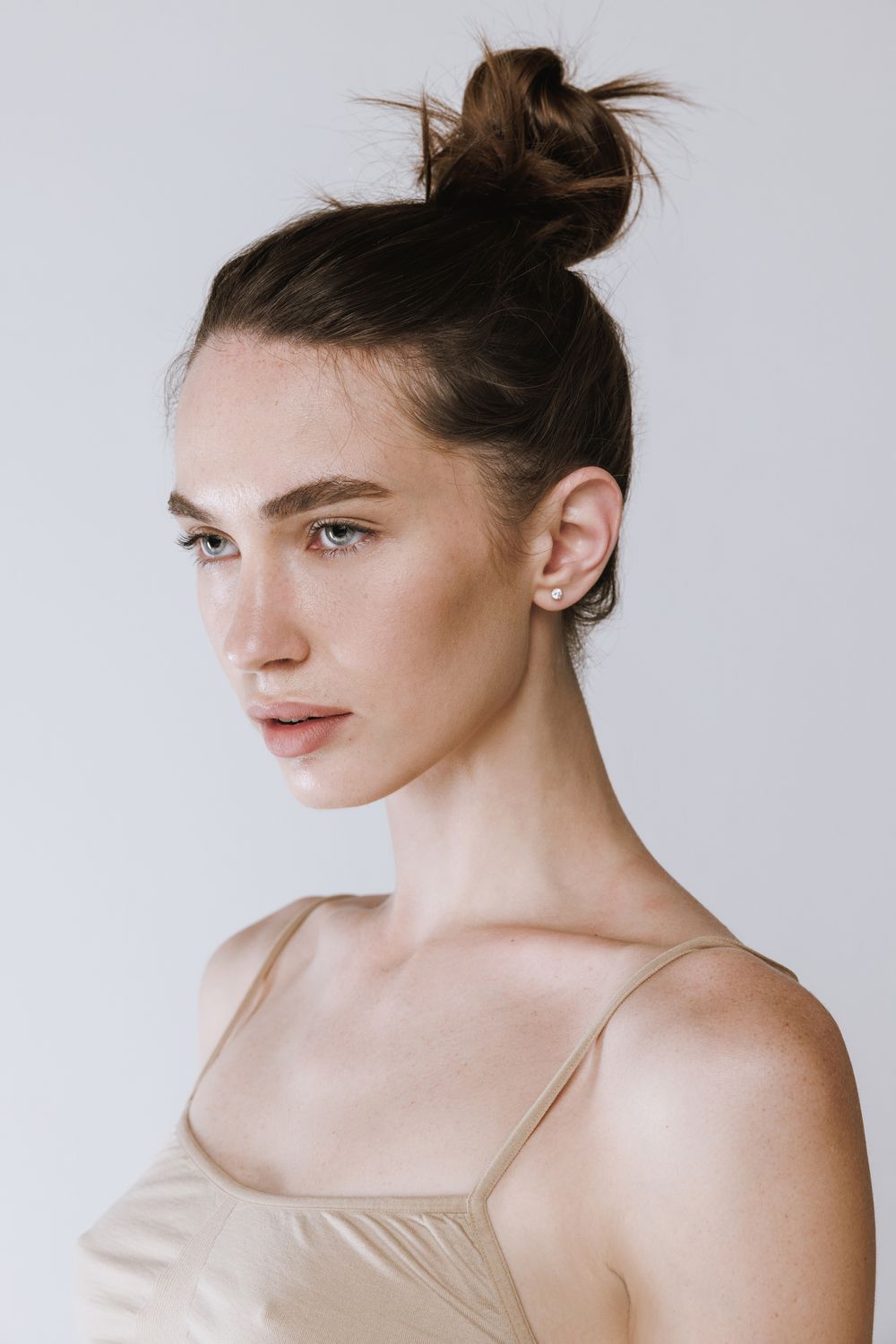 Model with elegant hairstyle and natural makeup.